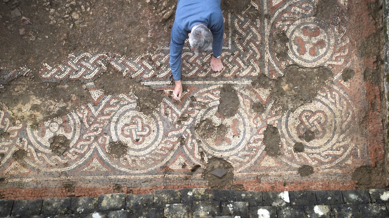 Excavating a mosaic floor at Chedworth Roman Villa